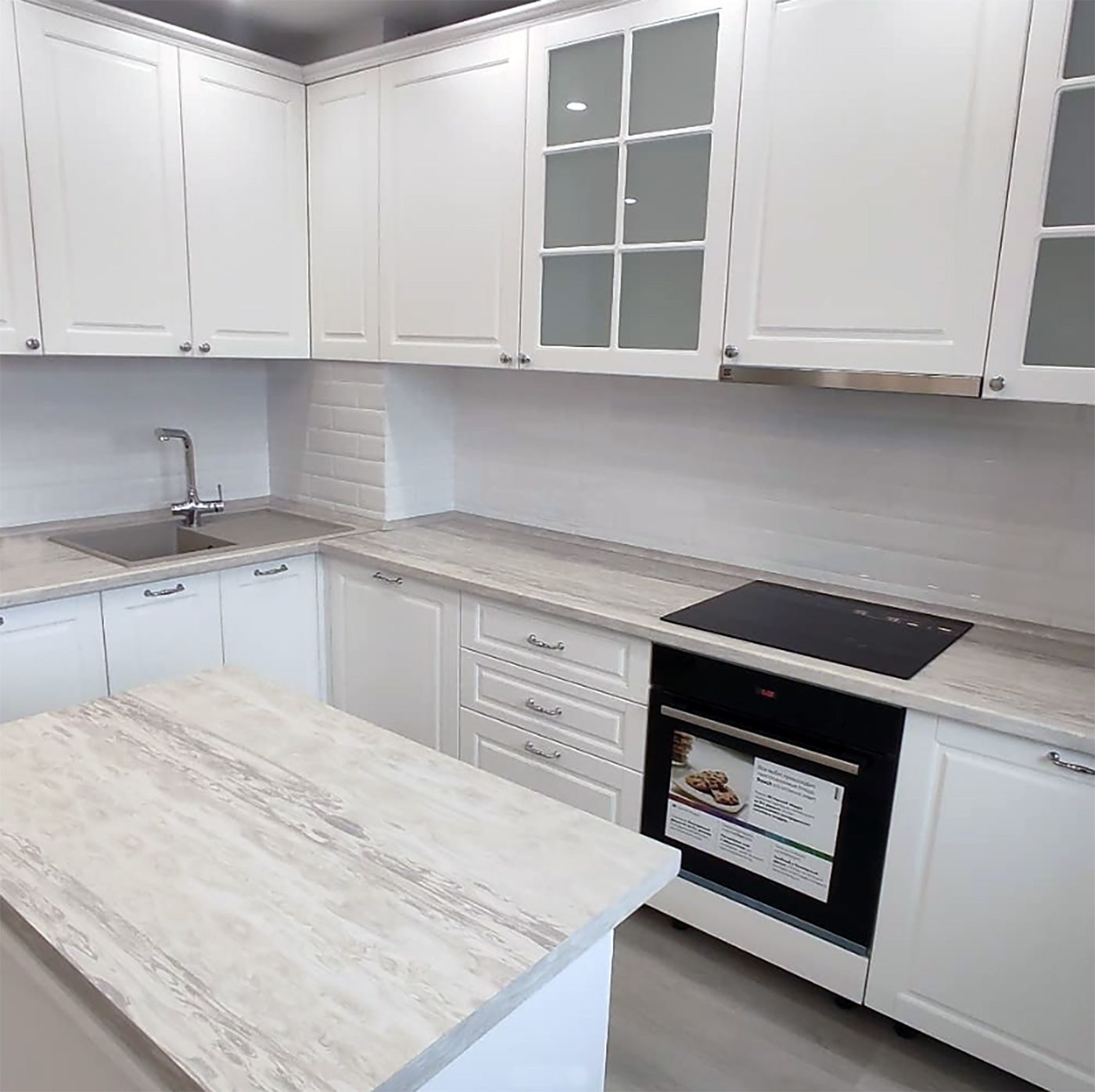 White framed kitchen with island