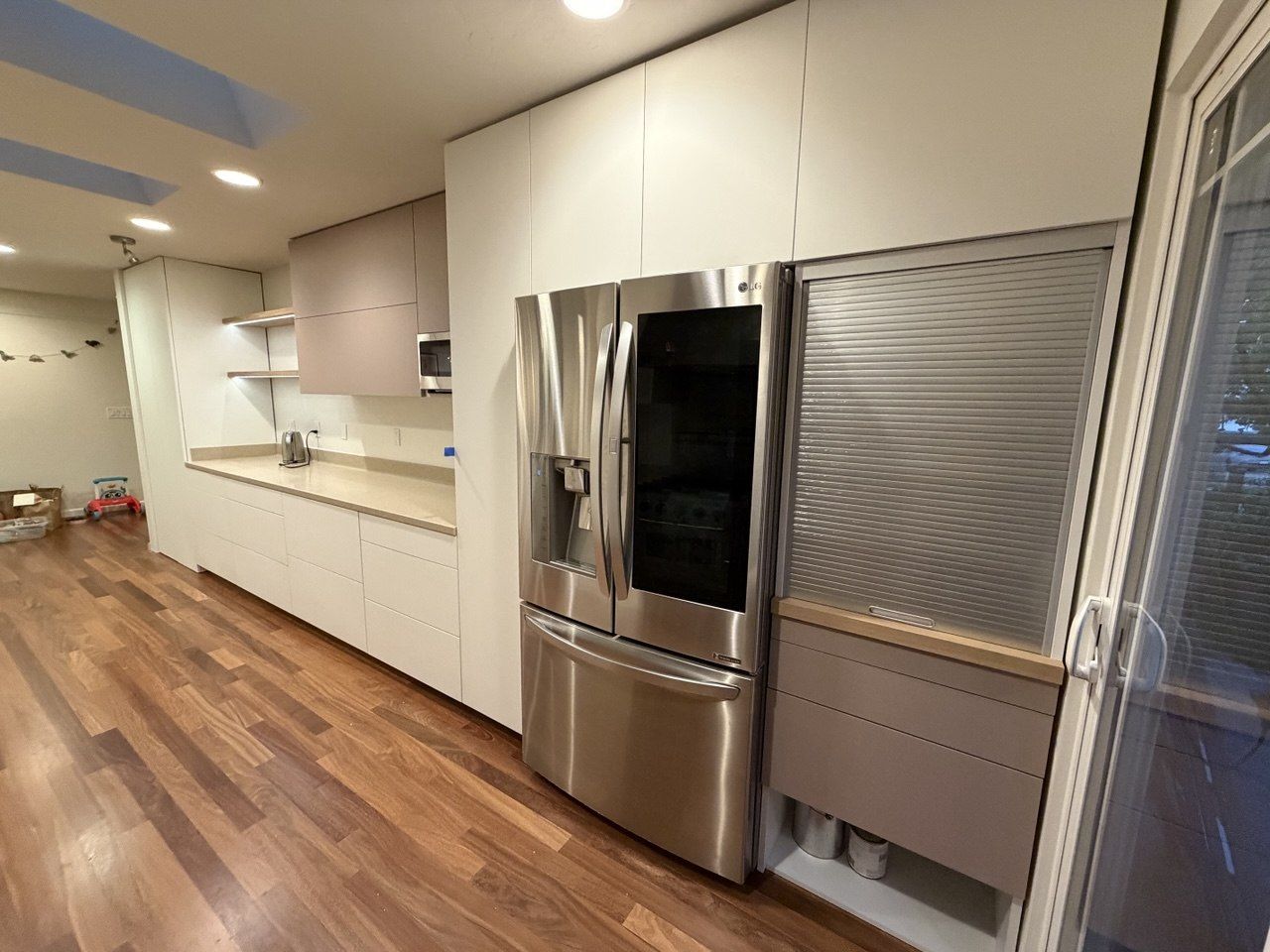 Tall cabinets and roll-up appliance garage