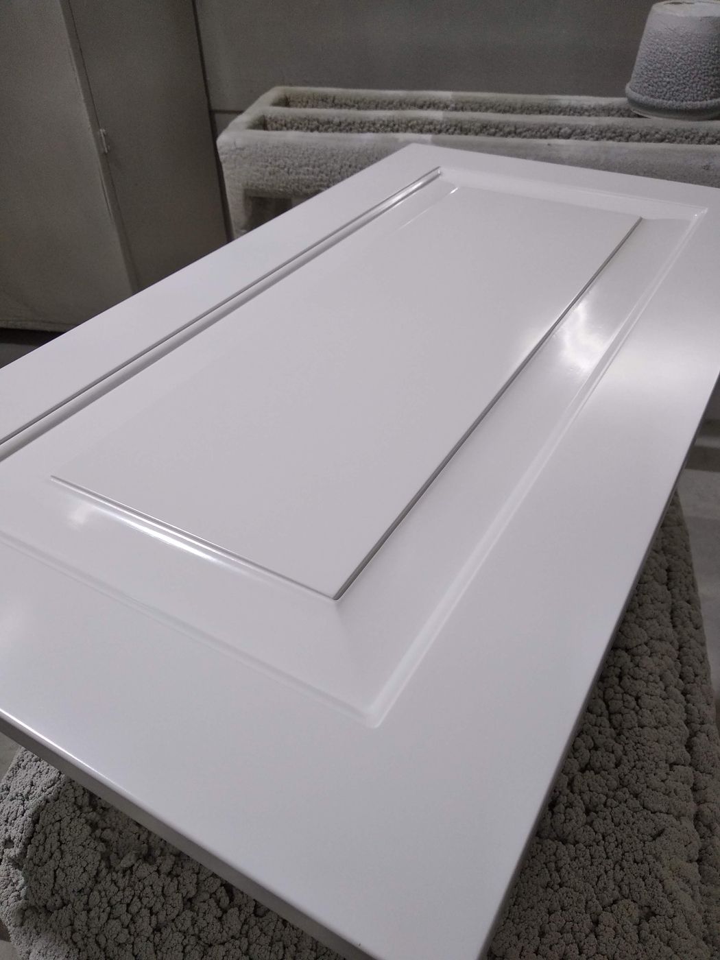 White raised-panel door