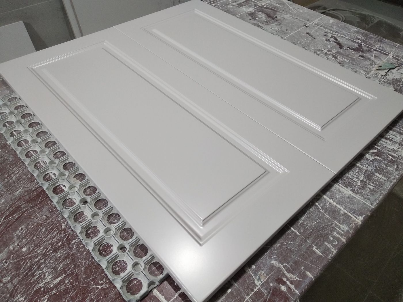 Pair of grey panel doors with a satin Renner finish
